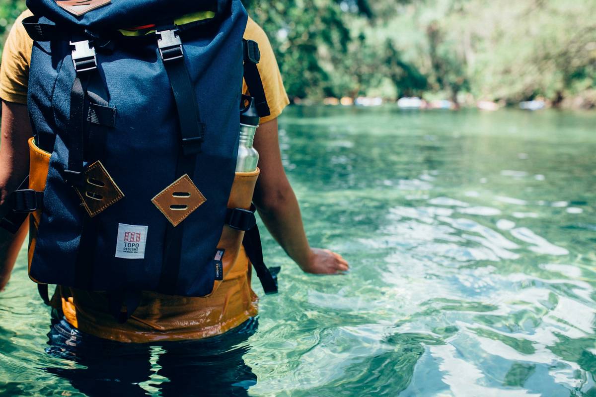 High-performance Backpack Rain Covers deployed on hiking backpacks in heavy rainfall
